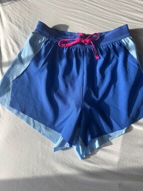 LSKD two tone cobalt blue/open air high rise accelerate shorts. Size xs